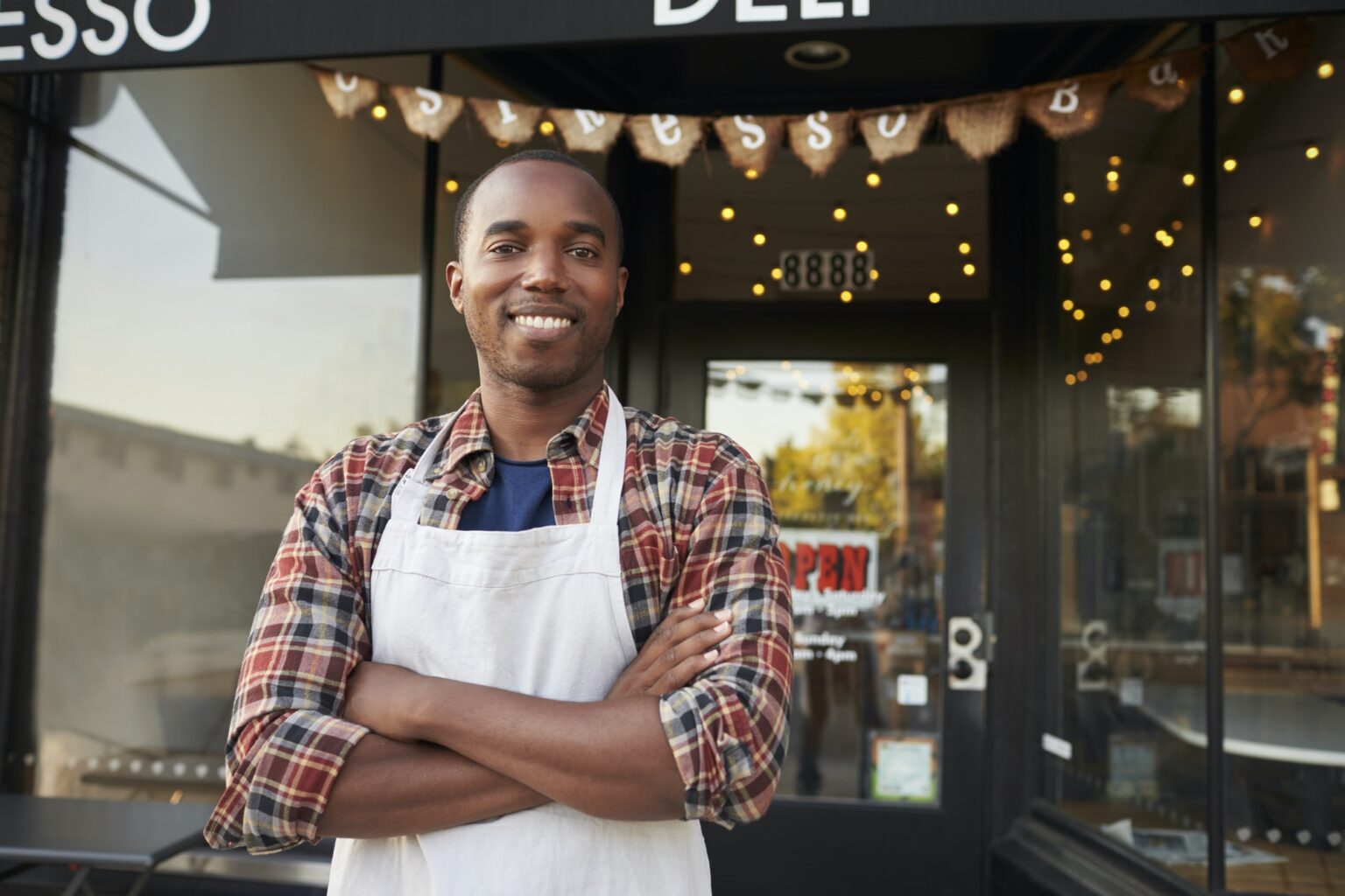 blackmalebusinessownerstandingoutsidecoffeeshop1536x1024 | Cross Bizz | Cross Bizz